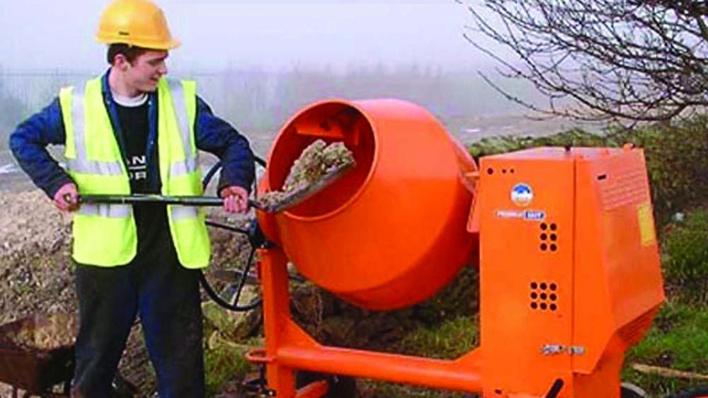 workman using machinery